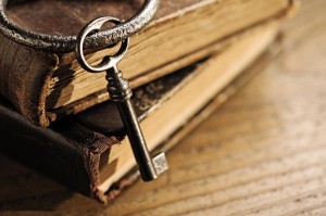 bigstock-Old-Keys-On-A-Old-Book-30054383